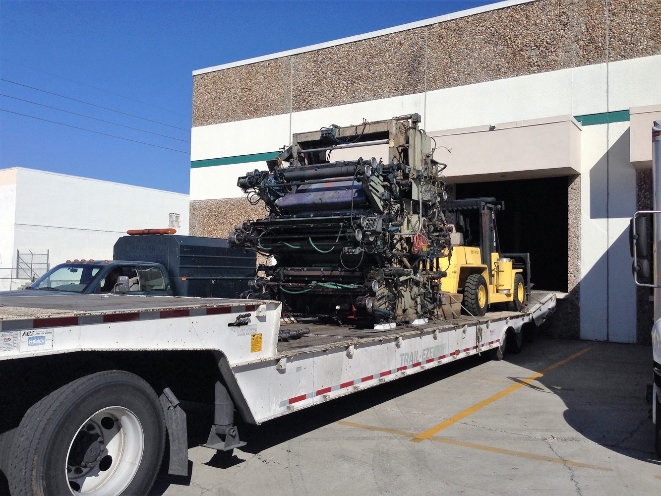 contact us 27 all american crating | truck loading of heavy equipment
